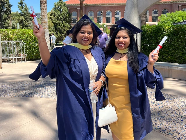 Graduates outside Centennial Hall